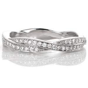 Milwaukee unique wedding bands with infinity twist pattern. This woven wedding band features micro pave diamond bands twisted together for a stunning look.