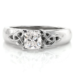 Let your heritage shine with this pristine example of Celtic design. A 0.70 carat princess cut center diamond is distinctively set within chevron prongs. Traditional Celtic knots with openwork frame flank the center diamond. The 14k white gold band has a wider look with rounded profile for a comfortable fit.