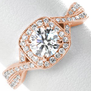 Micro pave engagement ring in Tulsa with cushion shaped halo framed by a twisted band.