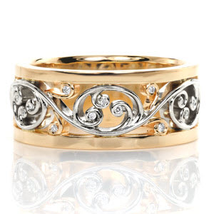 Elegantly crafted in rich 14k yellow gold, Design 3317 is a definite statement piece to stand alone or paired with another ring for a bold look. Flowing filigree curls hand crafted in 14k white gold bring contrast to the piece. Hand set round diamonds add just the proper amount of sparkle to each filigree curl.