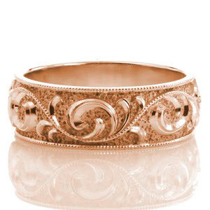 Miami wide band ring with relief scroll engraving and milgrain texture.