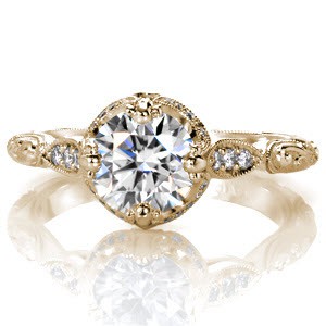 Custom engagement ring with round brilliant center stone, engraved band, diamonds and milgrain in Memphis.