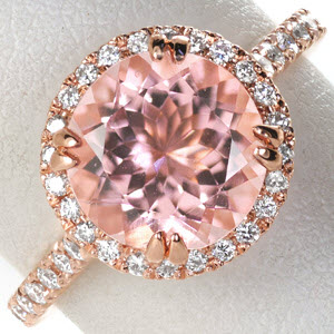 Rose gold engagement ring in Rochester with diamond halo, micro pave diamond band and morganite center stone.