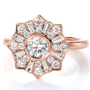 Rose gold custom engagement ring in San Francisco with a unique star burst halo surrounding a round center diamond.