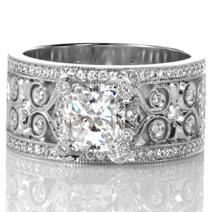 Omaha unique engagement ring with filigree detailed with diamonds and milgrain. This unique radiant cut engagement ring is simply stunning.