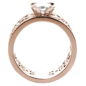 Rose gold custom engagement ring in St Petersburg with a unique wide diamond patterned band holding an emerald cut diamond center stone.