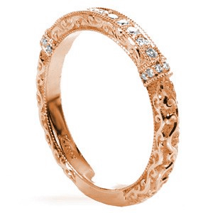 Edmonton unique wedding bands with relief hand engraving and diamond in rose gold.