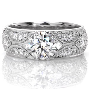 Our signature North Star band is the perfect foundation to frame a beautiful 1.00 carat round brilliant cut diamond held within a low eight-prong setting. A melody of arched bead set diamonds, star shapes and milgrain edges create a visually interesting setting with a glittering diamond at its center.
