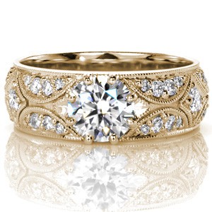 Yellow gold engagement ring in Tucson with diamond band and round brilliant center stone.
