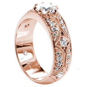 Las Vegas engagement ring with round brilliant center stone, milgrain texture and micro pave diamonds.