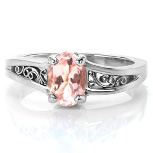 Las Vegas custom engagement ring with morganite center stone and filigree in a white gold setting.