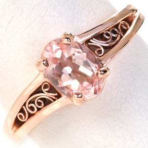 Dayton rose gold engagement ring with filigree and oval morganite center stone.
