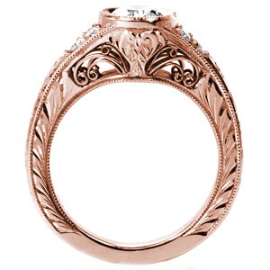 Vancouver rose gold custom engagement ring with a bezel set oval center diamond and a hand engraved band.