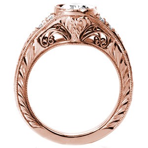 Philadelphia antique inspired custom engagement  ring with a bezel set oval center diamond and a hand engraved band.
