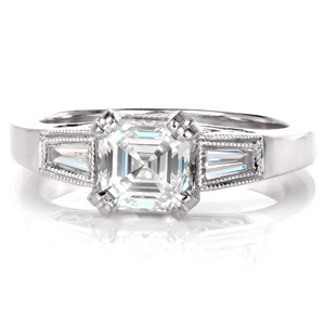 Vintage inspired custom engagement ring in Providence with an asscher cut center diamond held by diamond set prongs and profile filigree curls.