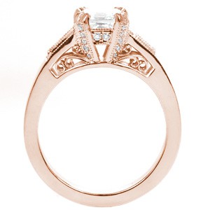 Rose gold custom engagement ring in Pittsburgh with an asscher cut center diamond held by diamond set prongs and profile filigree curls.