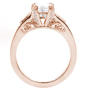 Vintage inspired custom engagement ring in Orlando with an asscher cut center diamond held by diamond set prongs and profile filigree curls.