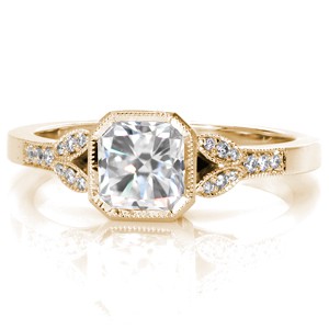 Vintage inspired custom engagement ring in New Orleans with a radiant cut center diamond and a milgrain edged split shank. 