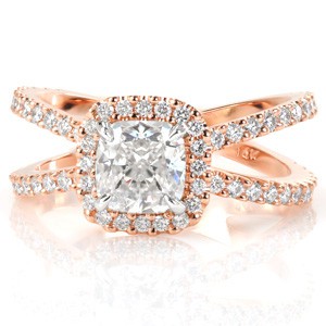 Rose gold custom engagement ring with a split diamond band with a halo surrounding a cushion cut center in Des Moines.