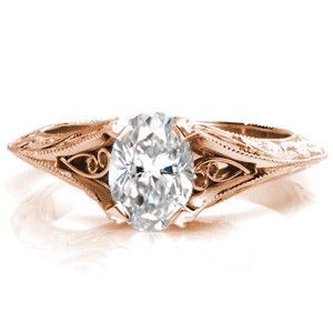 Antique engagement ring in New Orleans with filigree, milgrain and relief scroll engraving. 