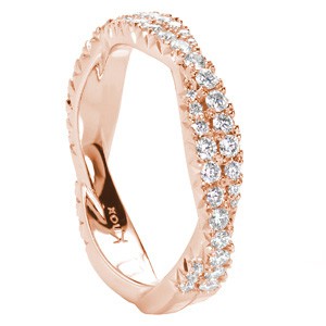 Custom rose gold wedding ring with twisted diamond bands in Raleigh.