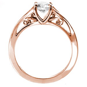 Rose gold custom engagement ring featuring a round brilliant center diamond held in a unique filigree setting in Sarasota.