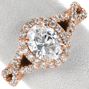 Custom engagement ring with oval center stone, diamond halo and woven band in Jacksonville.