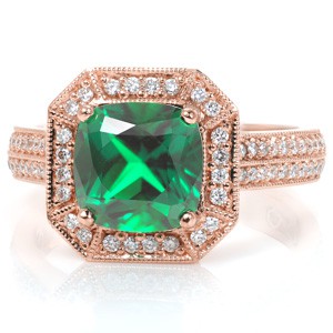 A regal setting crafted in 14k yellow gold, Design 3404 presents a bold statement piece. The cushion cut emerald is framed with an impressive bevel corner micro pavé halo supported by a double-row micro pavé band. The center basket, bevel corners and inside plate are finished with hand formed filigree. 