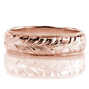 This classic wedding band design features an exquisitely engraved full wheat pattern flowing in a full eternity span around the ring. The lines change in depth throughout the pattern to create movement as light plays across the surface of the design. 