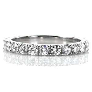 Featuring 2.20 millimeter diameter round brilliant diamonds, Design 3457 is a stunning wedding band or anniversary ring design. The gems are held in hand formed U-cut settings; a French pavé setting style. This creates an elegant scalloped view from the sides, while maximizing the sparkle from the stones!