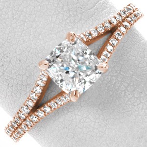 Houston rose gold wedding ring with cushion center stone and split-shank diamond band.