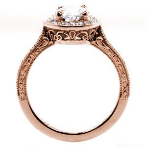 Massachusetts rose gold engagement ring with oval center stone, hand engraving and filigree. 