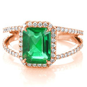 Design 3498 is crafted in 950 Platinum Ruthenium, and presents a stunning 2.20 carat emerald cut center gemstone. The natural Emerald is set within four tapering prongs.  The split shank band and halo have a classic look of  micro pavé with hand set round cut diamonds.