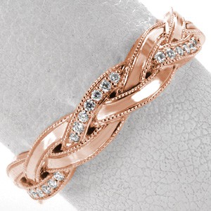 Rose gold wedding ring in Ottawa with single micro pave band braided between two high polished bands.