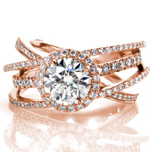 Halo engagement ring in Richmond with overlapping diamond bands and round brilliant center stone.