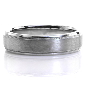 A contemporary wedding band, the Denver features high polished sides, with a brushed finish in the center. The pinstripes delineating between finishes contain milgrain texture for added detail. Little details such as the milgrain, and hand applied finishes are some of the true signs of an heirloom piece.