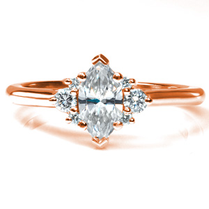 Design 3694 is shown with a 0.70 marquise center stone in a simple yet elegant setting. A cluster of three stones accents each side of the marquise, and the stones all rest in a cathedral setting. The highly polished band draws the eye to the brilliant, sparkling center. 