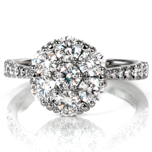 Design 3709 is a vintage inspired beauty featuring seven perfectly matched diamonds cradled in a unique, low setting. Graduated diamonds adorn the band, which tapers elegantly into the center, adding extra sparkle and dimension. The high polish on the band glimmers along with the diamonds. 