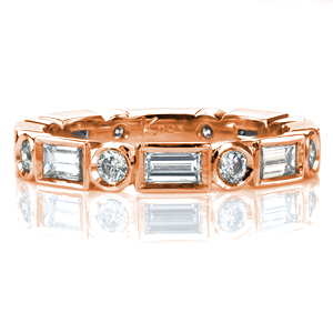 Design 3727 is striking on its own or stacked with other bands. It features alternating bezel set round brilliant diamonds and baguettes of more than 1 carat total weight in an eternity band. Contemporary and geometric, this design is sure to get noticed!