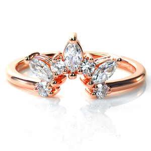 Design 3736 features a combination of dazzling round brilliant and marquise cut diamonds, custom contoured to fit around an engagement ring. This ring can be easily customized around any shape center stone. A stunning way to add dimension and sparkle to your wedding set, this design definitely makes a statement!