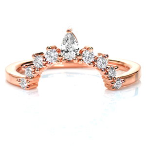 Perfectly contoured to fit around your engagement ring, Design 3784 adds just the right amount of sparkle to your wedding set. A pear shaped diamond is flanked by round brilliant diamonds that taper in size toward the polished band. Like a tiara for your engagement ring, this band adds an elegant flair. 
