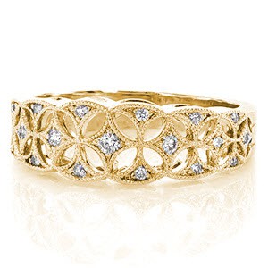 Unique diamond band in Virginia Beach with small round diamonds set within an intricate star burst pattern.