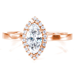 A shimmering 1 carat marquise cut diamond is surrounded by sparkle in this classic halo design. The cathedral setting allows any style of wedding band to sit flush against the high-polished flat band, making this a truly versatile and timeless engagement ring. 
