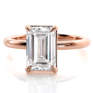 Understated elegance at its finest, Design 3870 features a stunning 3.5 carat emerald cut diamond in a classic solitaire setting. The straight basket perfectly complements the clean lines of the diamond, and the thin band allows any wedding band to sit flush. 