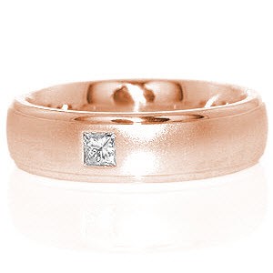 The sleek look of our Chicago band features a comfort fit profile and a mixture of high polish and matte finishes. The high polish rounded rails provide comfort and add contrast to the matte finish center. One .14 carat square cut diamond is flush set for added character. 