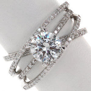 Custom engagement ring in Allentown with four overlapping diamond bands and round brilliant center. 