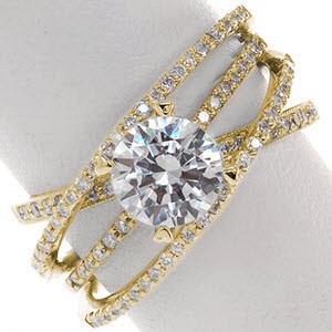 Wide band engagement ring with round brilliant center stone and four overlapping diamond bands in Fresno.