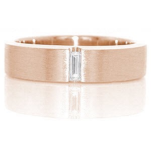 Forged from 14k white gold, the Gotham band is an ultra-modern design with sleek lines. The center focus is a baguette cut diamond totaling 0.20 carats and channel set within the metal. The structured band has straight, high polished edges that offset the top brushed finish.